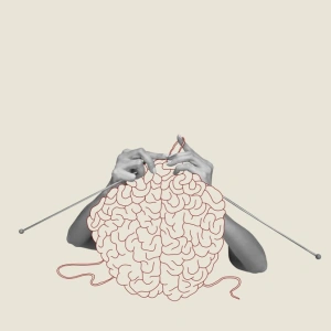 Zwei Hände stricken ein Gehirn.