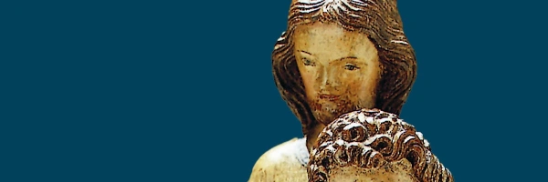 Mitgefühl setzt Stille voraus. Anregungen für das seelsorgerliche Gespräch. Banner von einer Jesus Figur mit einer Person die sich an ihm lehnt.